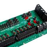Close-up of a green electronic DC hub board with connectors and labels on a white background
