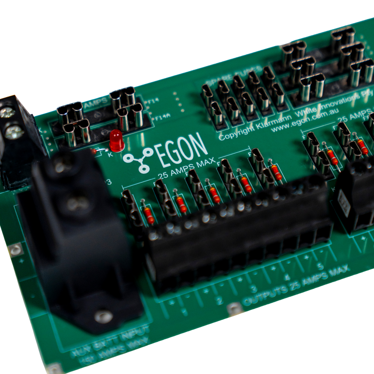 Green electronic circuit board with 'EGON' branding on a white background