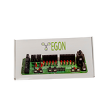 Green electronic control panel with various components on a white background