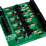 Close-up of a green electronic circuit board with components labeled 'EGON'.